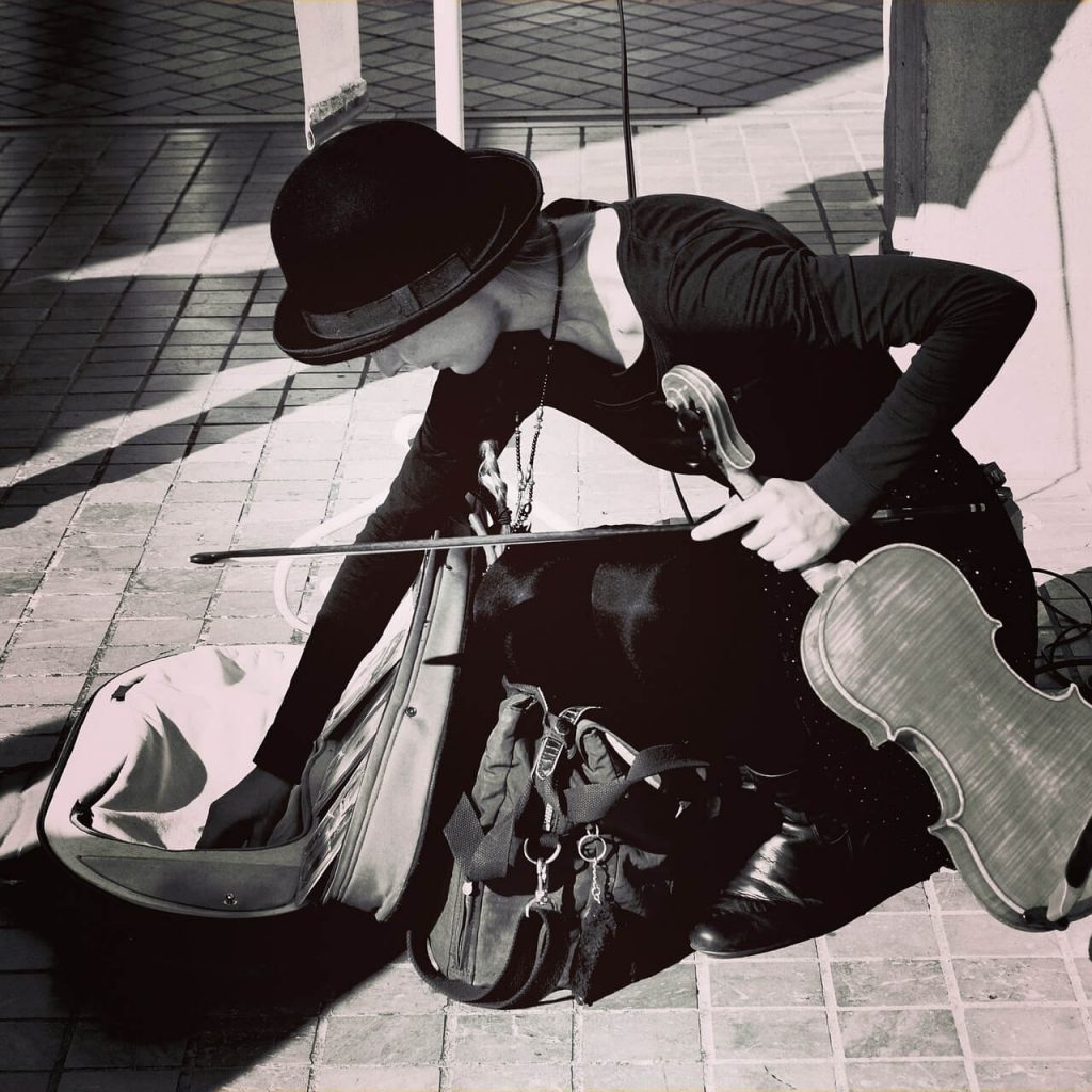 violinist with violin case