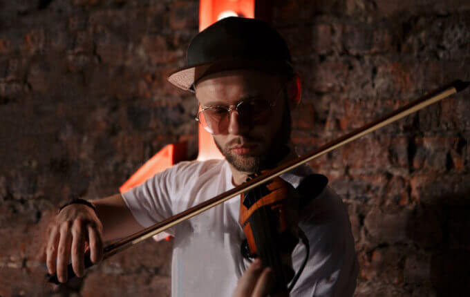 man playing electric violin